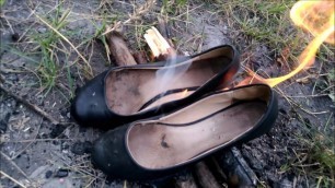 Wife burning her old flats and tights and me stomp on ashes.