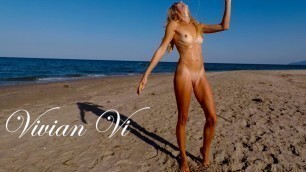 Naked Workout on the beach -  a beautiful skinny milf with small tits
